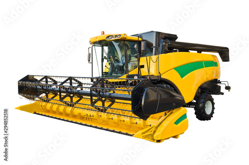 Modern agricultural combine isolated on a white background photo