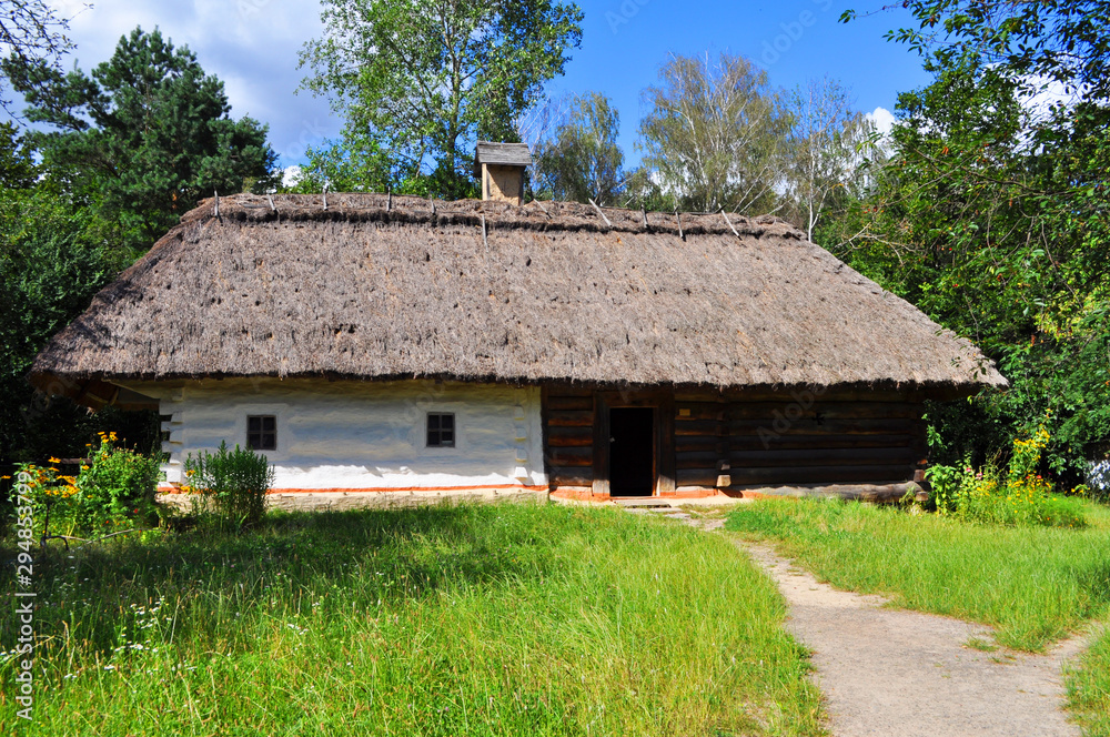 day in an old willage, old wooden house, clay house, straw roof