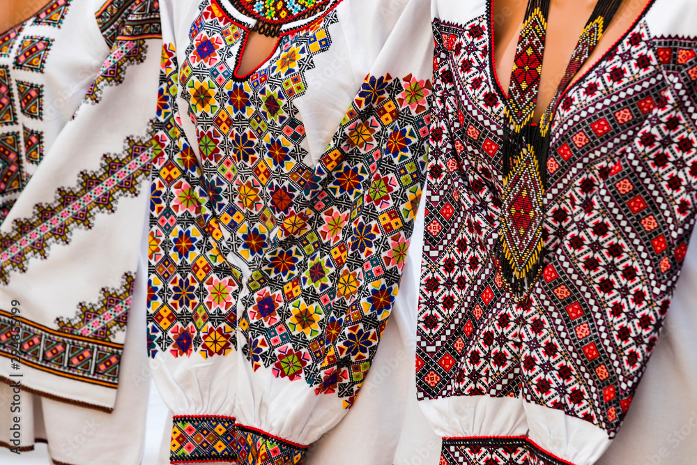 Traditional Ukrainian clothing embroidered with colored women's in men's  shirts of embroidered shirt. Stock Photo | Adobe Stock