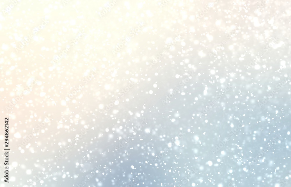 Thick snowfall on light defocus background. Shiny winter illustration. Fluffy snow pattern. Delicate yellow blue pastel blur backdrop.