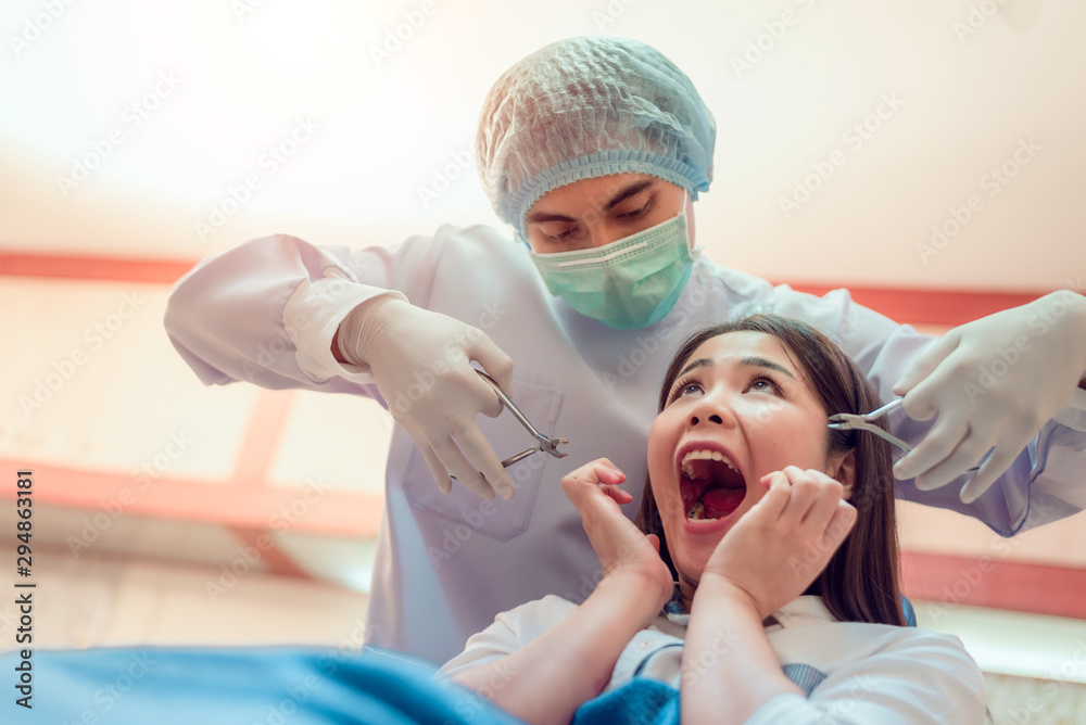 portrait of scared patient close her mouth at dentist clinic. dental care problem
