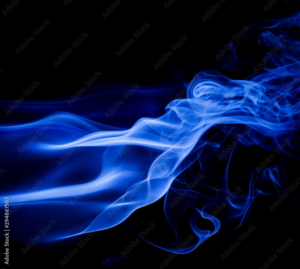 Blue smoke on black background