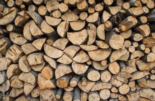 Firewood texture. Wooden sticks lie on top of each other.