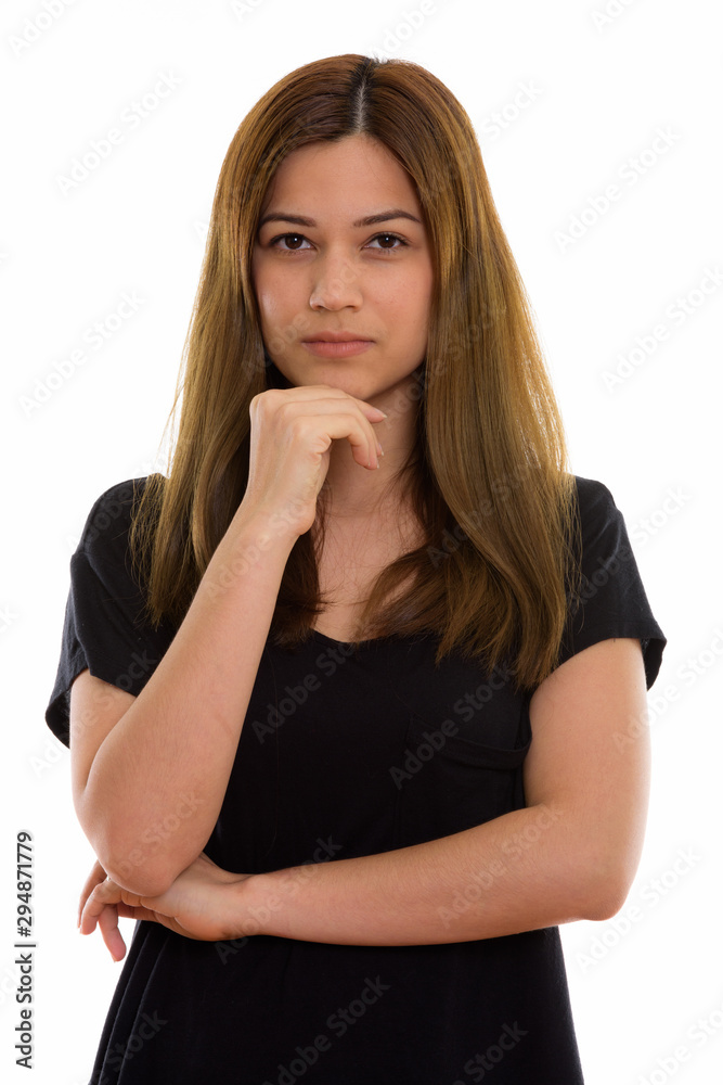 Studio shot of young beautiful woman thinking Studio shot of young beautiful woman thinking