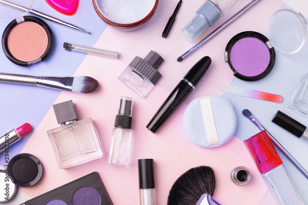 Makeup products and cosmetics, flat lay. Fashion and beauty blogging concept. Top view Makeup products and cosmetics, flat lay. Fashion and beauty blogging concept. Top view