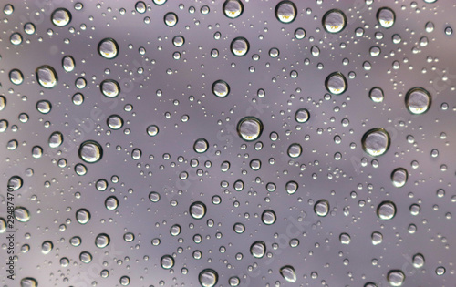 silver colored background with raindrops