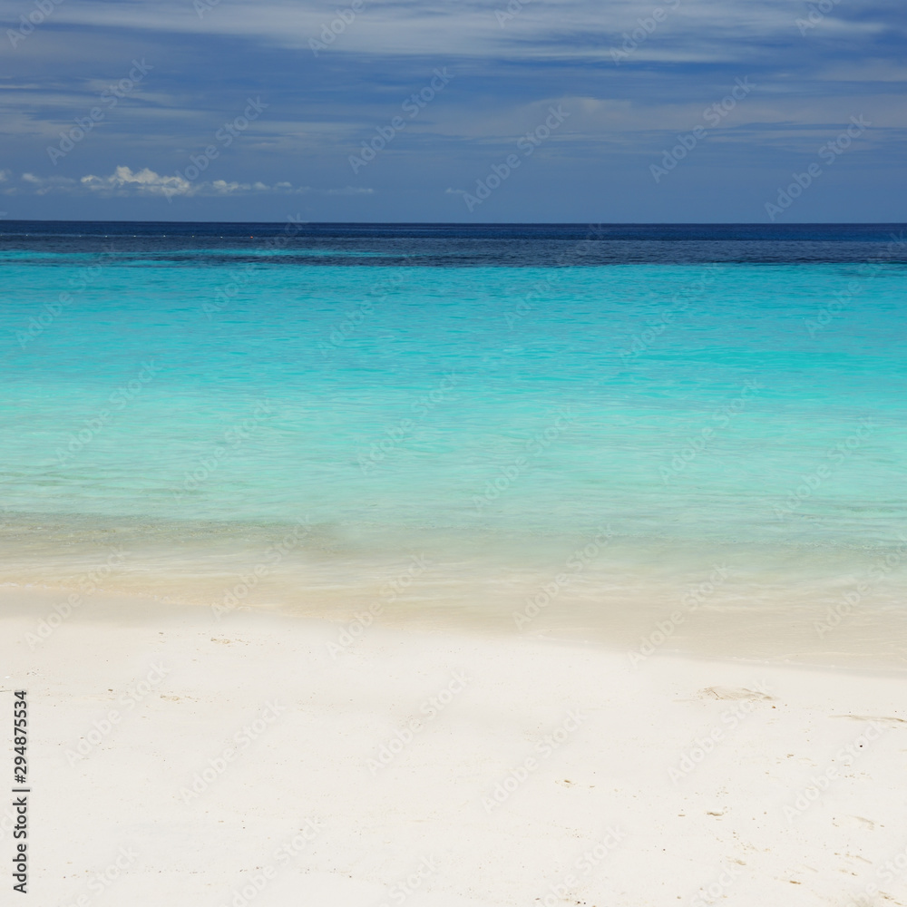 Ocean background with white beach sand