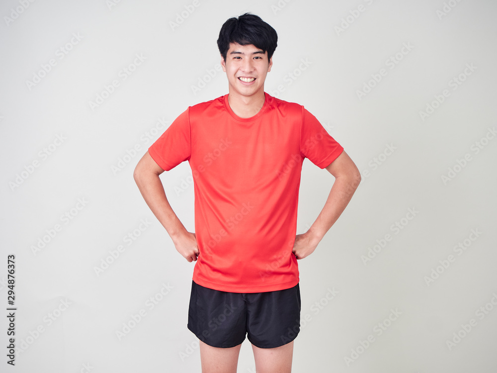 Young man sports player stretching and exercising Young man sports player stretching and exercising