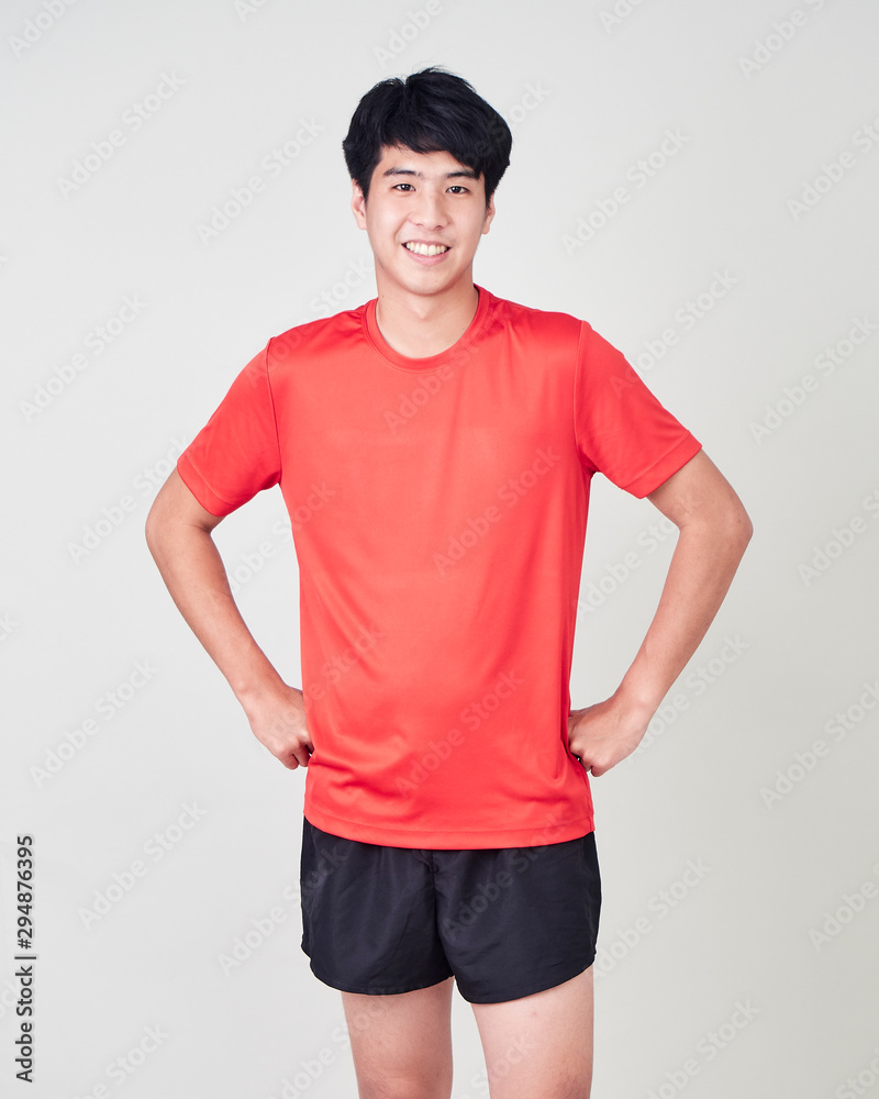 Young man sports player stretching and exercising Young man sports player stretching and exercising