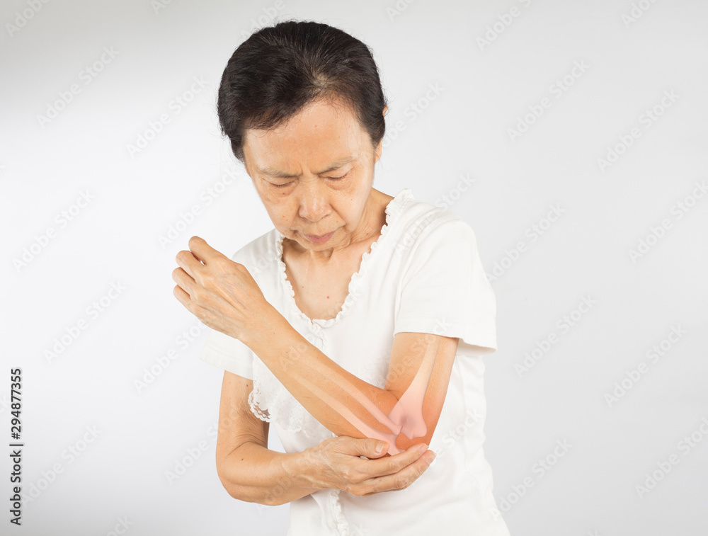 old asian woman feel elbow bones injury old asian woman feel elbow bones injury