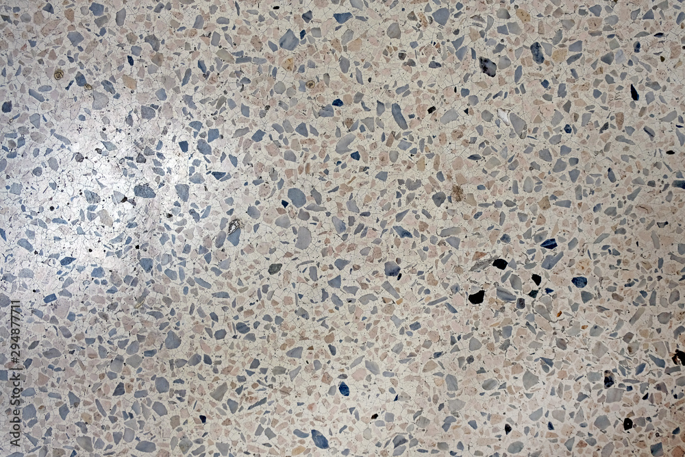 Terrazzo flooring pattern. Fragment of a dirty floor, background Terrazzo flooring pattern. Fragment of a dirty floor, background