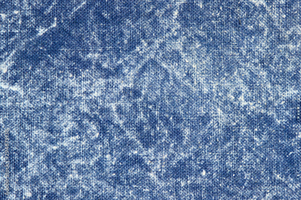 Texture of a blue stone-washed denim fabric Stock Photo