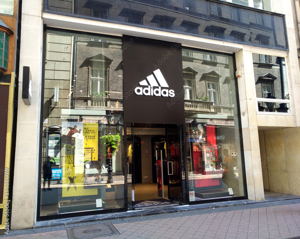 Budapest, Hungary - 3 august 2018: exterior of Adidas store and sign on  store in Fashion Street. Stock Photo | Adobe Stock