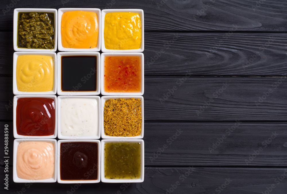 Fototapeta premium Set of different sauces in ceramic bowl