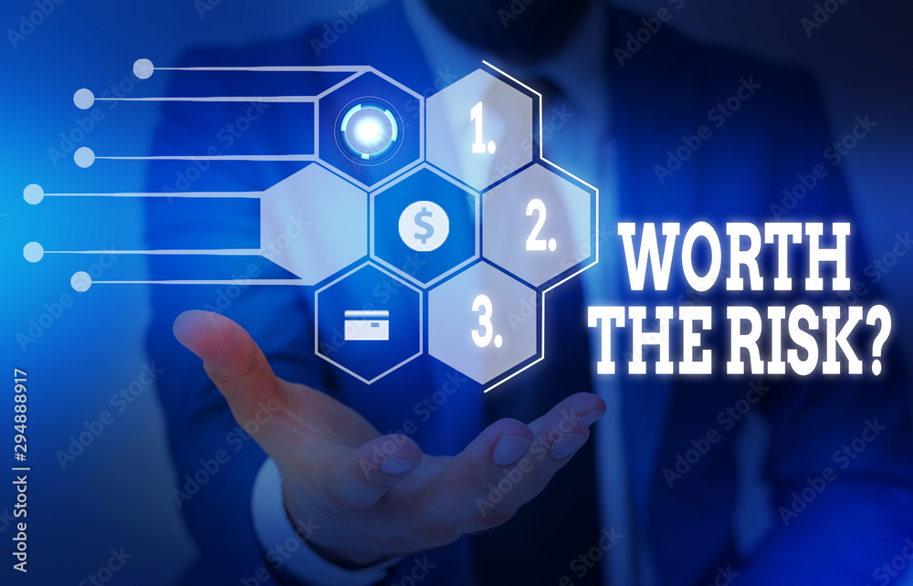 Writing note showing Worth The Risk Question. Business concept for asking if certain action balanced with its reaction Male wear formal suit presenting presentation smart device Writing note showing Worth The Risk Question. Business concept for asking if certain action balanced with its reaction Male wear formal suit presenting presentation smart device