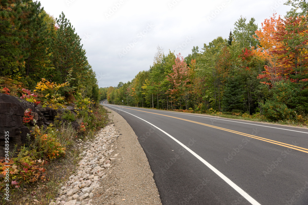 Empty street in the Mauricie National Park in Canada. Quebec Empty street in the Mauricie National Park in Canada. Quebec