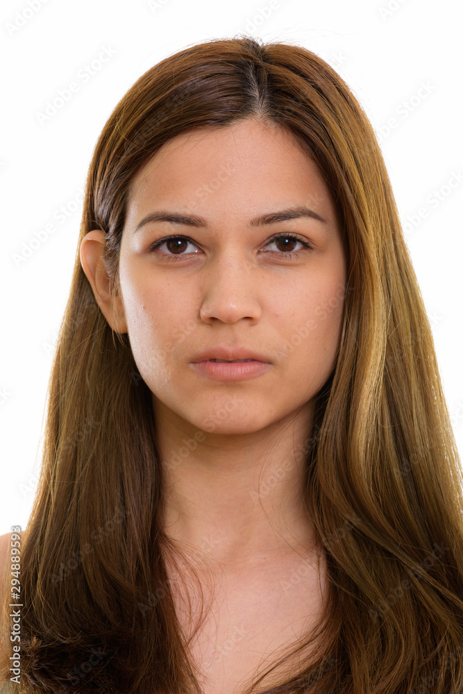 Studio shot of face of young beautiful woman Studio shot of face of young beautiful woman