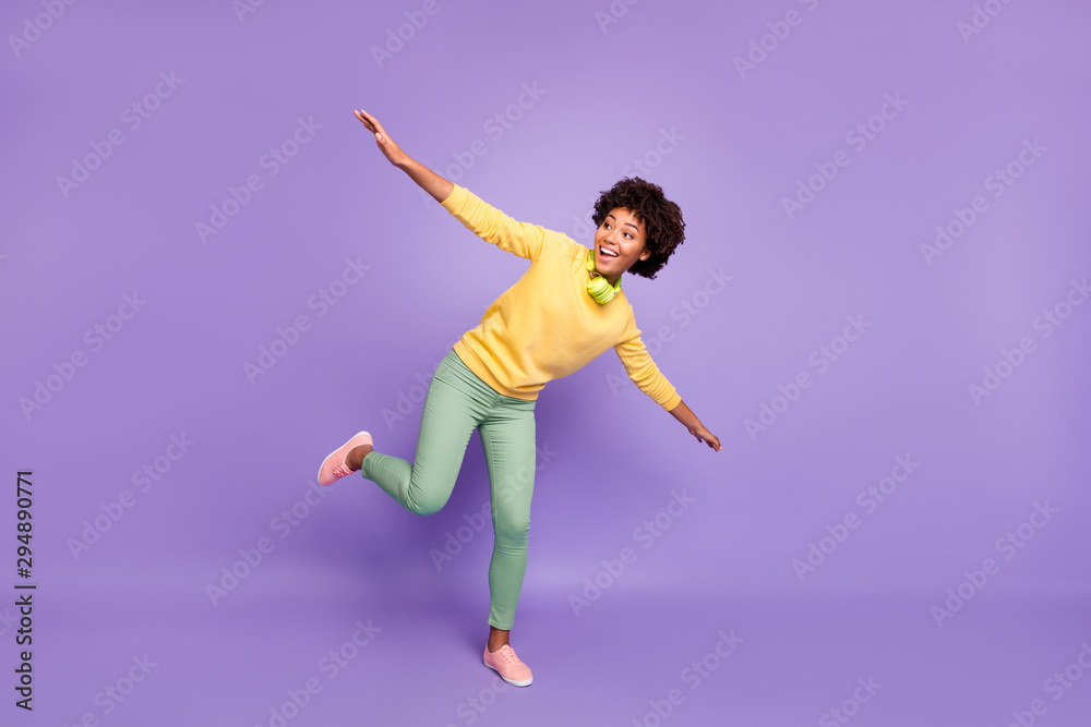 Full length body size view of her she nice attractive foolish cheerful cheery carefree dreamy wavy-haired girl having fun like plane flying isolated over violet purple lilac pastel color background