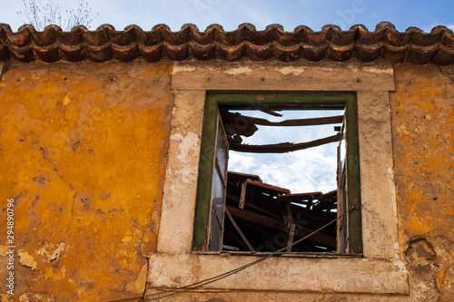 degraded yellow house in Odivelas photo