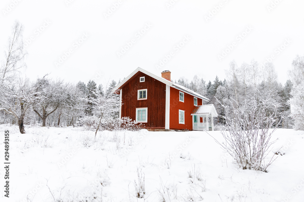 Red farmhouse in snow Red farmhouse in snow
