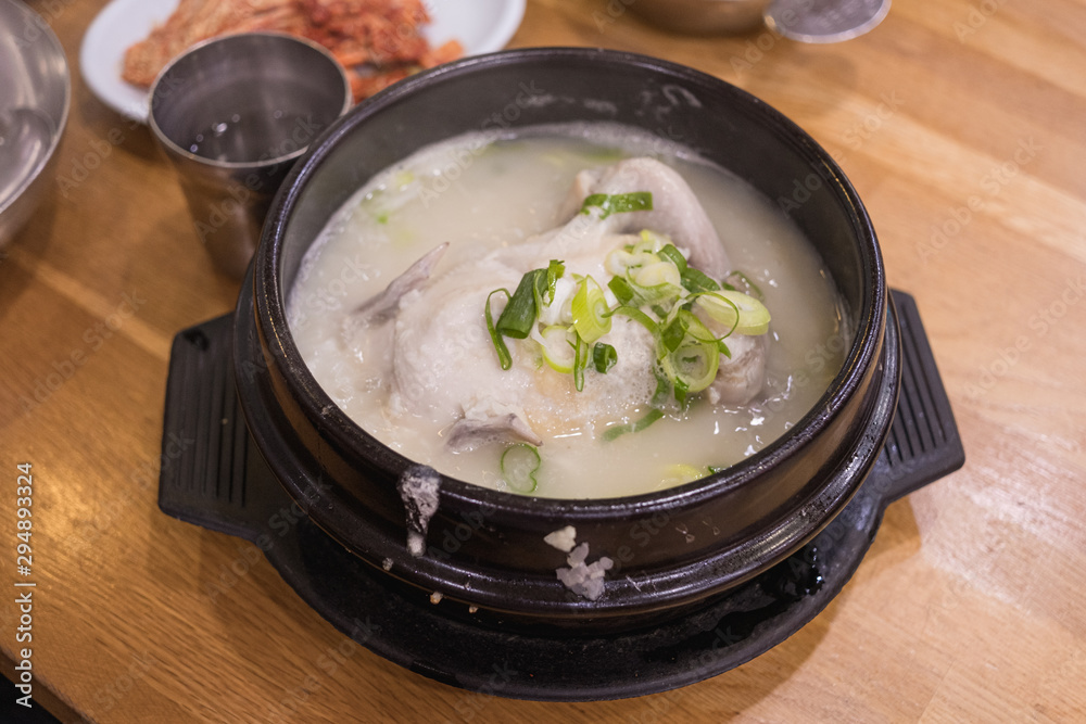 Traditional samgyetang, chicken soup with ginseng, Korean food. Traditional samgyetang, chicken soup with ginseng, Korean food.