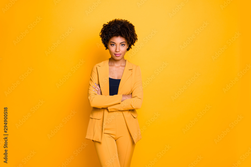 Portrait of her she nice-looking attractive charming pretty calm content wavy-haired girl folded arms summer clothing trend isolated over bright vivid shine vibrant yellow color background - obrazy, fototapety, plakaty 