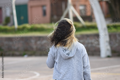 girl with hair on wind © Santiago