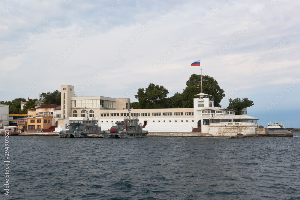 View from the sea to the building of the Water Station of the Red Banner Black Sea Fleet on the Nikolaev Cape of the city of Sevastopol, Crimea