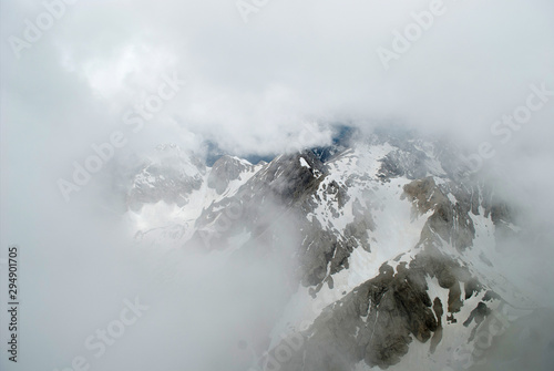 the fast clouds in the high mountains photo
