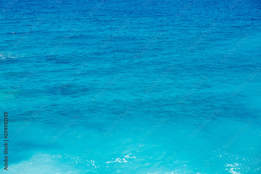 Background tropical blue clear transparent turquoise sea water, sunny weather