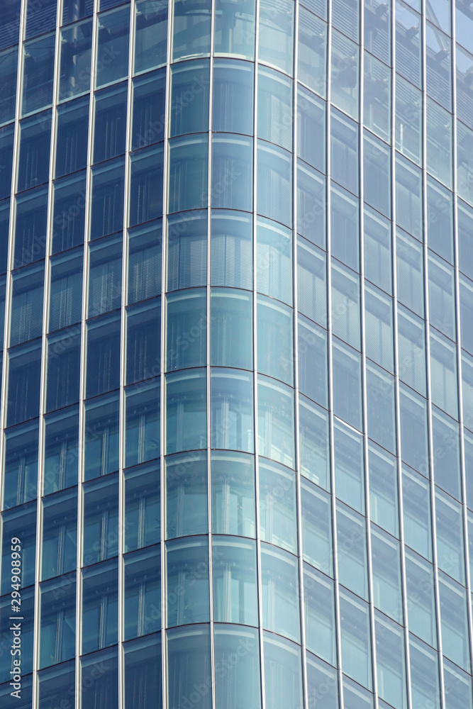 Modern glass silhouettes on modern building Modern glass silhouettes on modern building