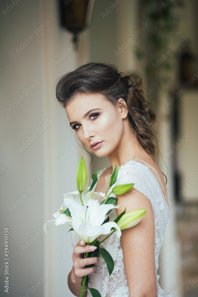 Portrait of bride in wedding dress with wedding bouquet Portrait of bride in wedding dress with wedding bouquet