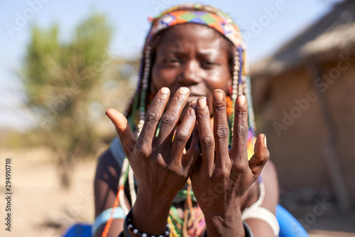 Detail of the hands of a Muhila traditional woman, Congolo, Angola photo