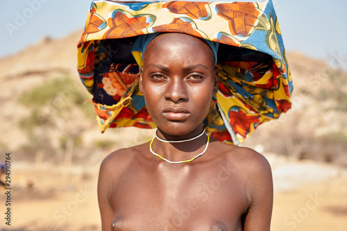 Young Mucubal woman with her traditional headscarf, Mucubal tribe, Tchitundo Hulo, Virei, Angola
