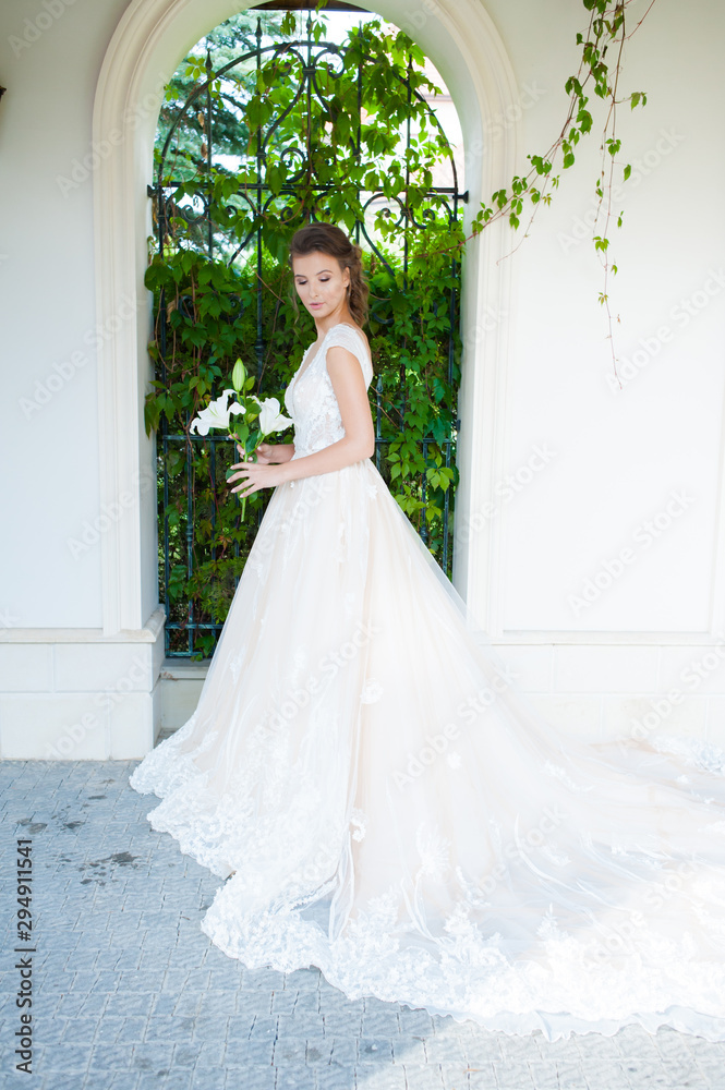 Charming Outdoor Bridal Portrait with wedding bouquet Charming Outdoor Bridal Portrait with wedding bouquet