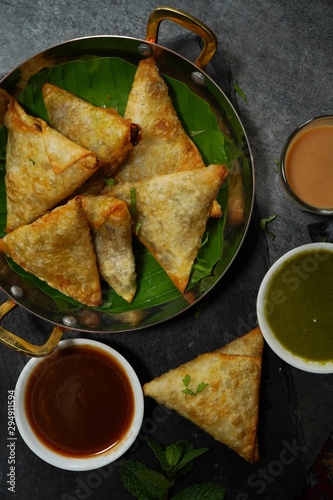 Homemade Samosas wiith Chutneys/Diwali snacks, selective focus photo