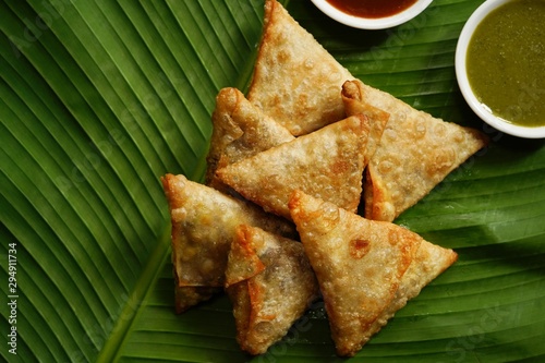 Homemade Samosas wiith Chutneys Diwali snacks  selective focus