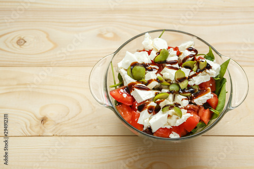 Glass bowl with Greek salad