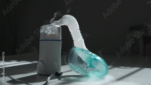 inhaler mask closeup with steam. Medical product. Cold treatment