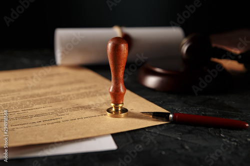 Фотография Notary's public pen and stamp on testament and last will