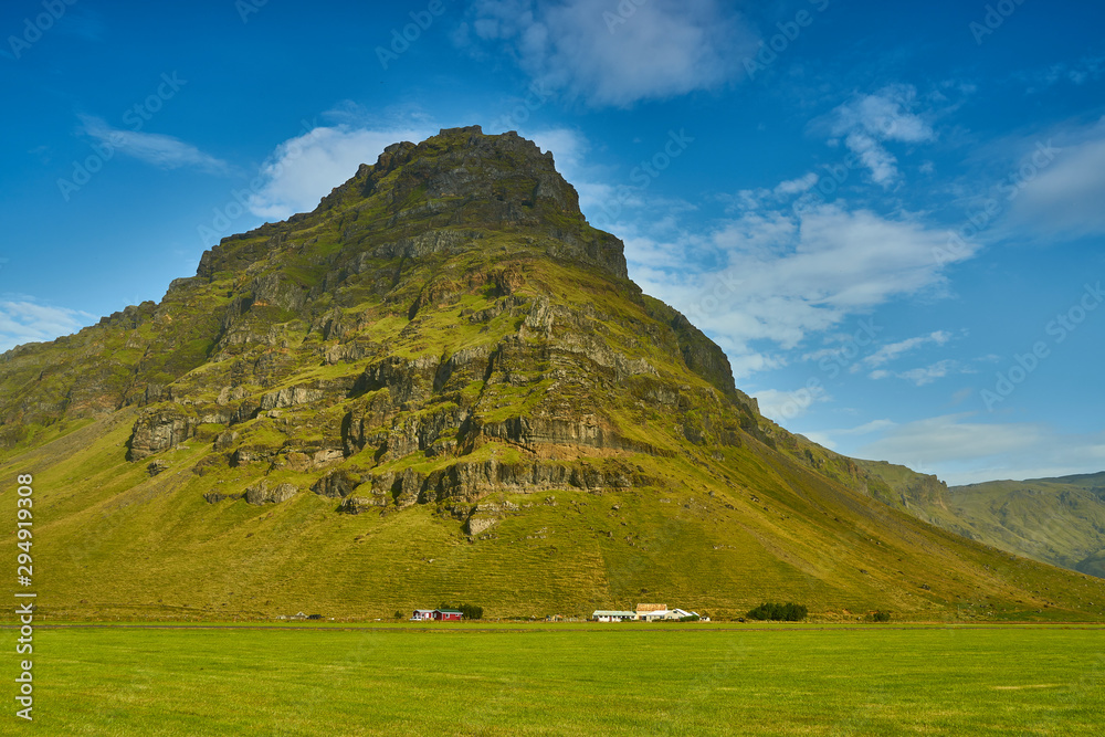 volcanic landscapes and farms in southern Iceland