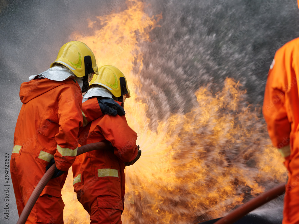 firefighter spray water to fire burning car workshop fire training firefighter spray water to fire burning car workshop fire training