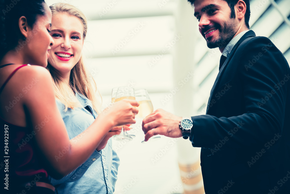 Business group Holding a champagne glass congratulate In the success of the business done together, to teamwork concept. Business group Holding a champagne glass congratulate In the success of the business done together, to teamwork concept.
