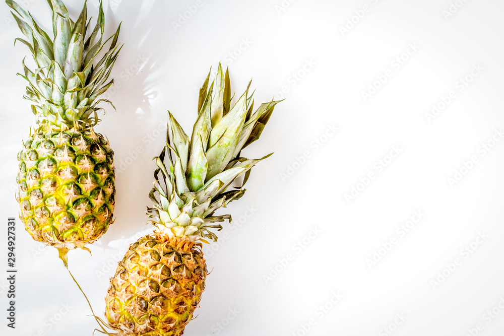 pineapple for exotic fruits design on white background top view space for text pineapple for exotic fruits design on white background top view space for text