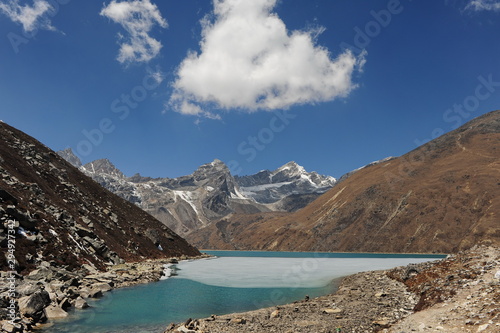 Nepal. Himalayan mountains. Snowy peaks of the Himalayas. Alpine glacial lakes. Snowy mountain peaks against the blue sky.