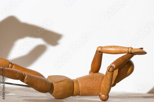 Billede på lærred articulated doll in what appears to be a fight