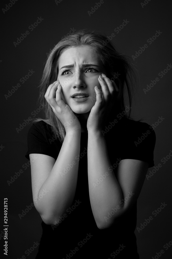 Portrait of scared young woman. Black and white Portrait of scared young woman. Black and white