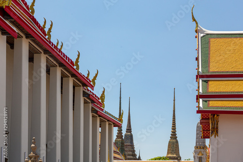 decorated rooftops of buddhist temple photo