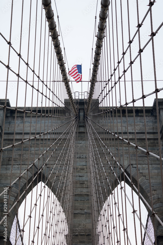 Fototapeta premium Looking Up At The Brooklyn Bridge In New York City, United States of America