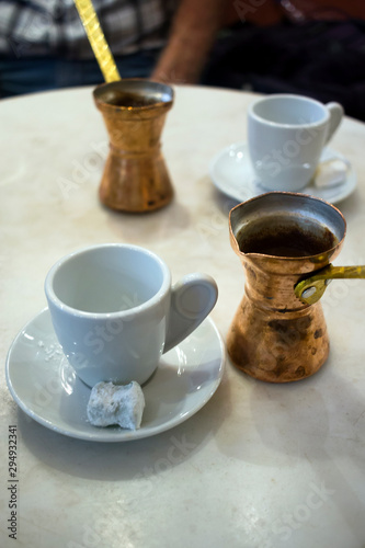 Greek coffee served with traditional greek coffee pots (Briki) and sweet loukoumi. Taken in Athens